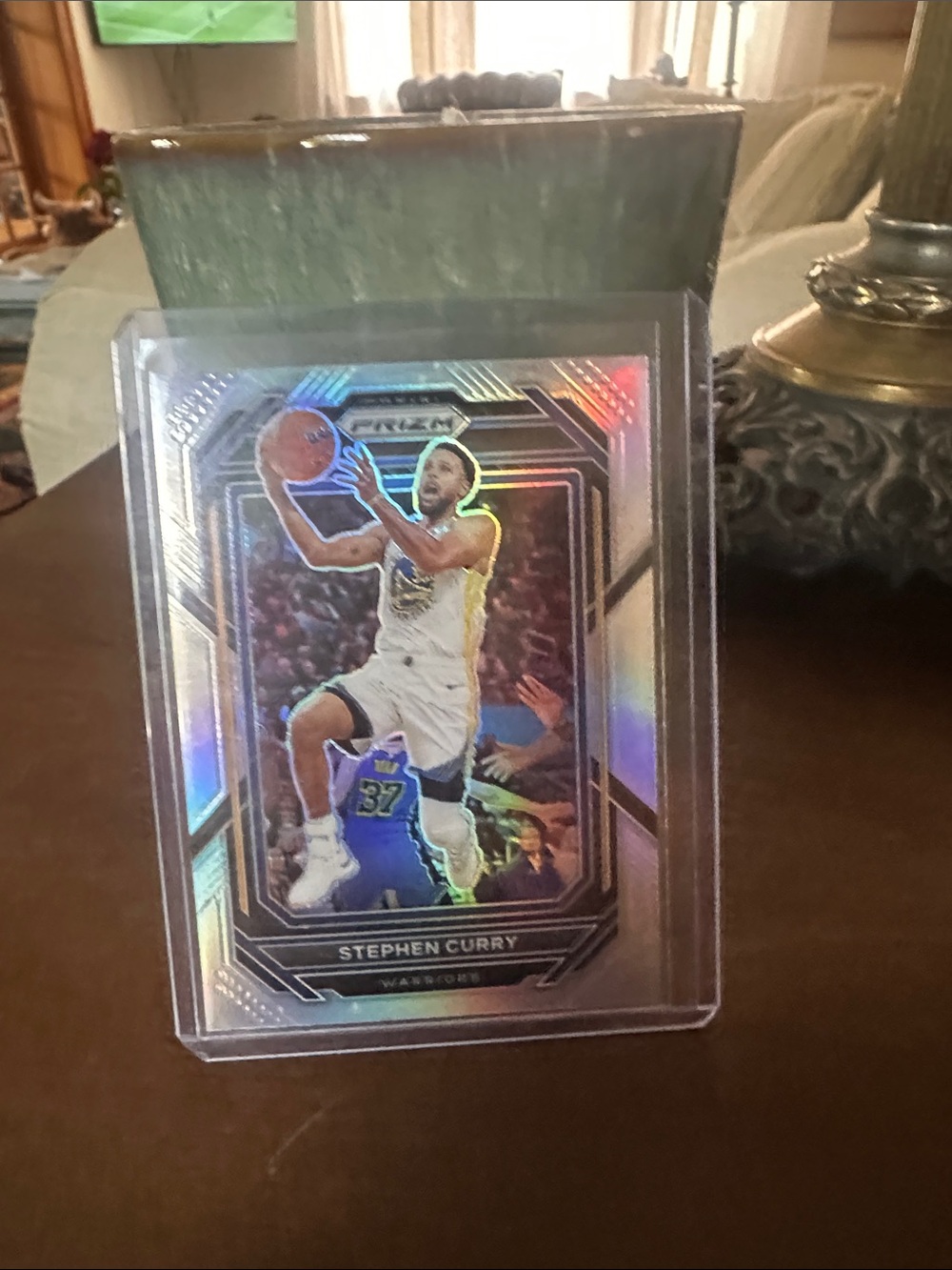 Panini Prizm Basketball Card - Silver, White, Gold Accents. Stephen curry